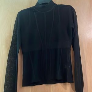 Sheer black long sleeve top. Never worn!